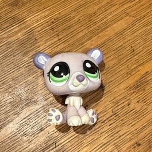 Cute Purple and White Toy Figure